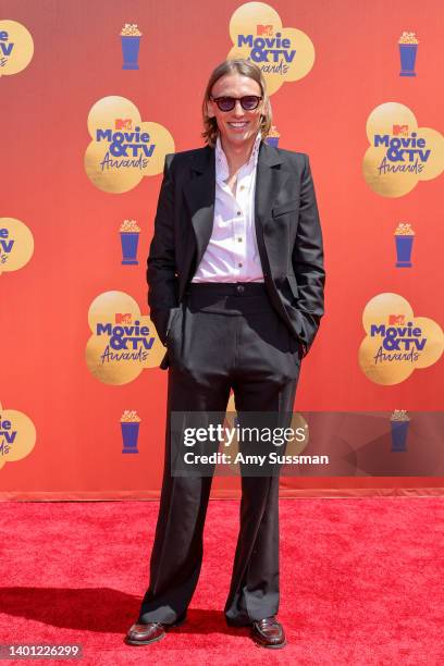 Jamie Campbell Bower attends the 2022 MTV Movie & TV Awards at Barker Hangar on June 05, 2022 in Santa Monica, California.