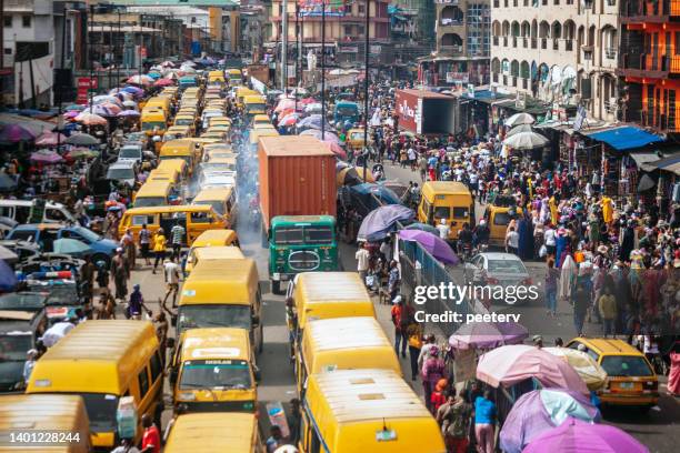 african megacity traffic - lagos, nigeria - lagos aerial stock pictures, royalty-free photos & images