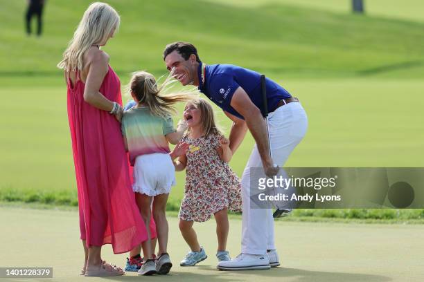 Billy Horschel of the United States celebrates with his wife, Brittany, and his kids Skylar, Colbie and Axel on the 18th green after winning the...