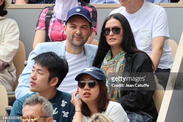 Chef Daniel Humm and Demi Moore attend the Men's Singles Final match on Day 15 of The French Open 2022 at Roland Garros on June 05, 2022 in Paris,...