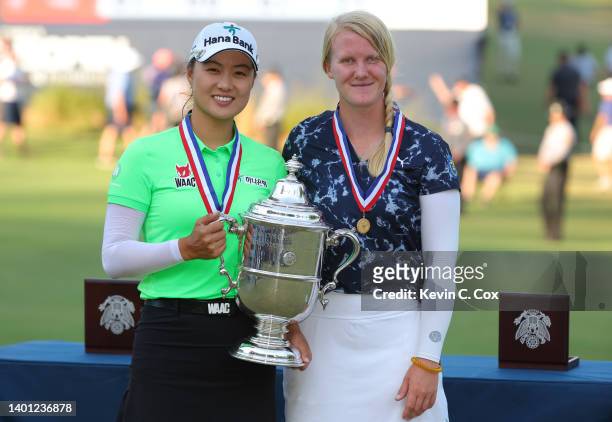 Minjee Lee of Australia and Ingrid Lindblad of Sweden pose after the conclusion of the 77th U.S. Women's Open at Pine Needles Lodge and Golf Club on...