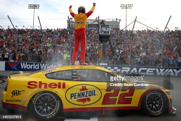 Joey Logano, driver of the Shell Pennzoil Ford, celebrates after winning the NASCAR Cup Series Enjoy Illinois 300 at WWT Raceway on June 05, 2022 in...