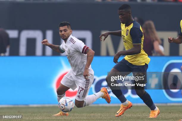 Jesus Corona of Mexico and Moises Isaac Caicedo of Ecuador battle for the ball during the friendly match between Mexico and Ecuador at Soldier Field...