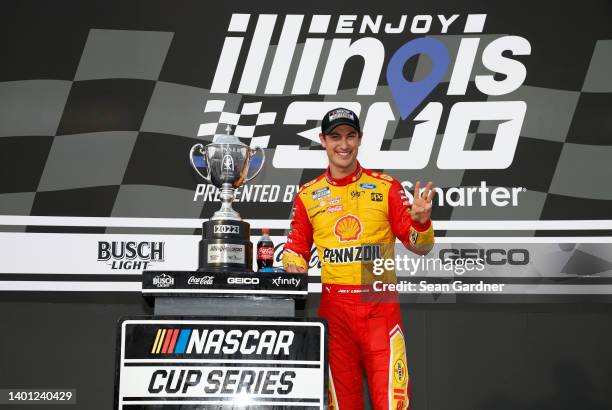 Joey Logano, driver of the Shell Pennzoil Ford, celebrates in victory lane after winning the NASCAR Cup Series Enjoy Illinois 300 at WWT Raceway on...