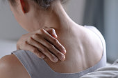 Woman has shoulder pain.