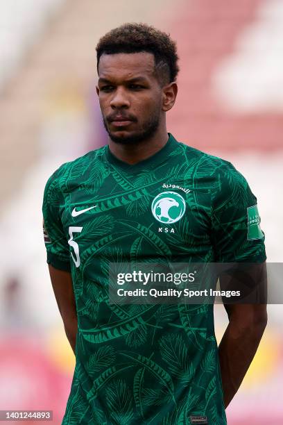 Ali Albulayhi of Saudi Arabia looks on during the national anthem prior to the international friendly match between Saudi Arabia and Colombia at...