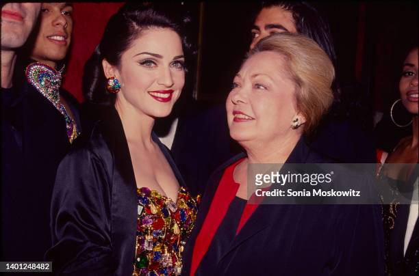 American singer & actress Madonna and Italian researcher and American Foundation for AIDS Research founder Dr Mathilde Krim attend the New York...