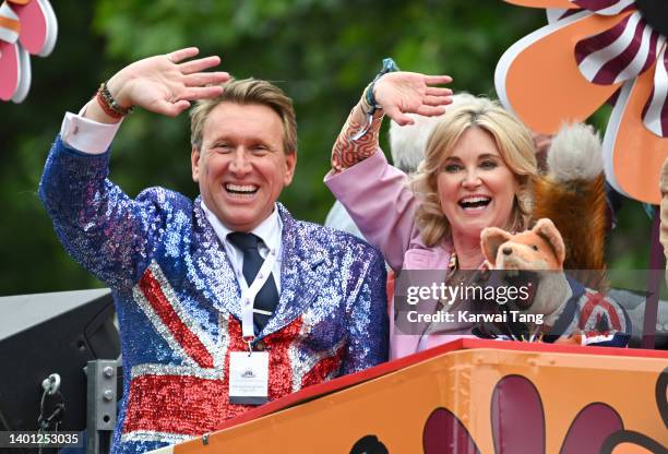 Michael Winsor and Anthea Turner ride a bus during the Platinum Pageant on June 05, 2022 in London, England. The Platinum Jubilee of Elizabeth II is...