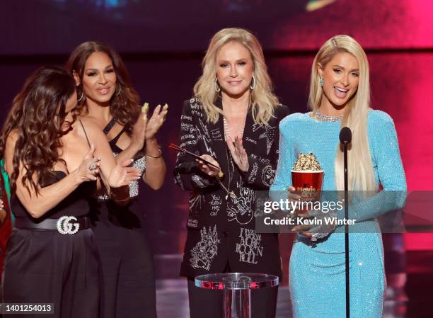 In this image released on June 5, Paris Hilton accepts award for Best Reality Return for 'Paris Hilton: Cooking with Paris & Paris in Love' onstage...