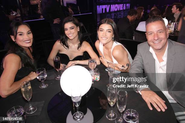 In this image released on June 5, Heidi D'Amelio, Dixie D'Amelio, Charli D'Amelio, and Marc D'Amelio attend the 2022 MTV Movie & TV Awards:...