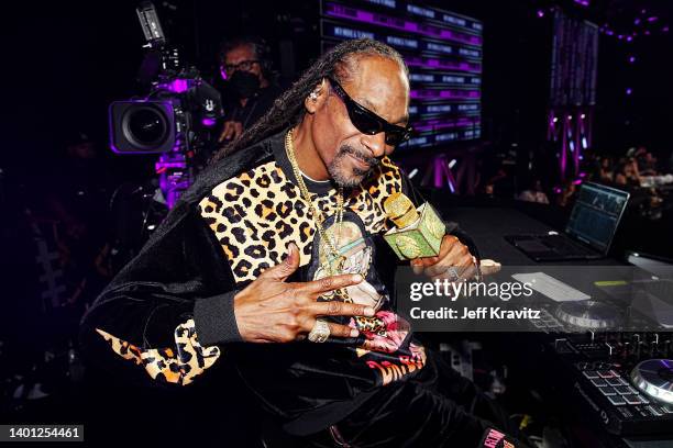 Snoop Dogg as DJ Snoopadelic performs during the 2022 MTV Movie & TV Awards at Barker Hangar on June 05, 2022 in Santa Monica, California.