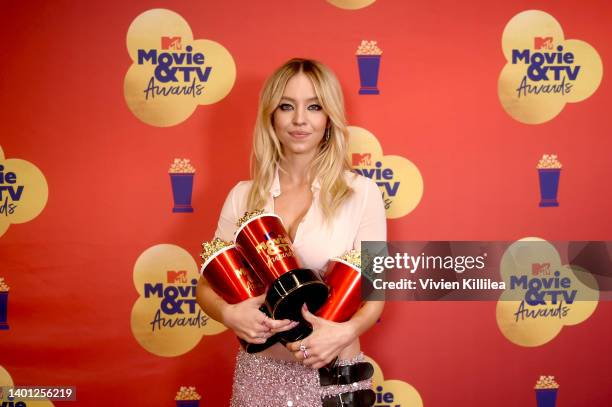 Sydney Sweeney, winner of the Best Show, Best Fight, and Here For The Hookup awards for ‘Euphoria’, poses backstage during the 2022 MTV Movie & TV...