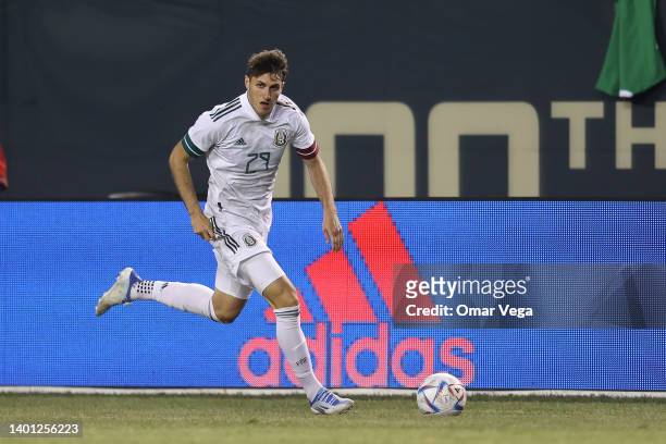 Santiago Gimenez of Mexico drives the ball during the friendly match between Mexico and Ecuador at Soldier Field on June 5, 2022 in Chicago, Illinois.
