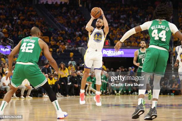 Stephen Curry of the Golden State Warriors shoots against the Boston Celtics during the third quarterin Game Two of the 2022 NBA Finals at Chase...