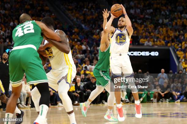 Stephen Curry of the Golden State Warriors shoots against the Boston Celtics during the third quarter in Game Two of the 2022 NBA Finals at Chase...