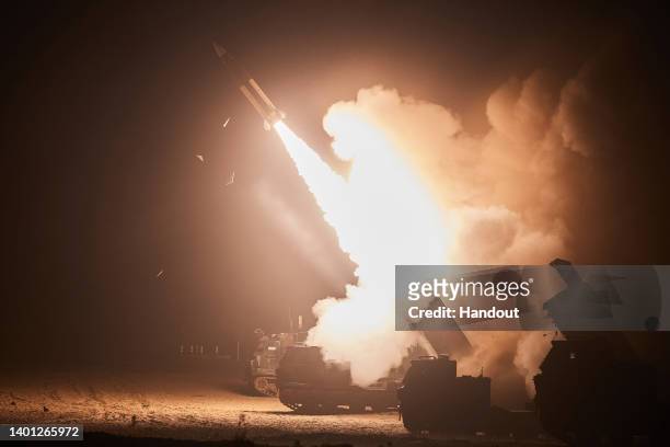 In this handout image released by the South Korean Defense Ministry via Dong-A Daily, a missile is fired during a joint training between the United...