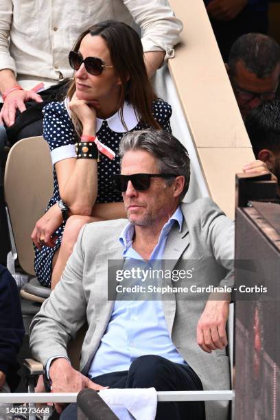 Hugh Grant and Anna Elisabet Eberstein attend the Men's Singles Final match on Day 15 of The 2022 French Open at Roland Garros on June 05, 2022 in...