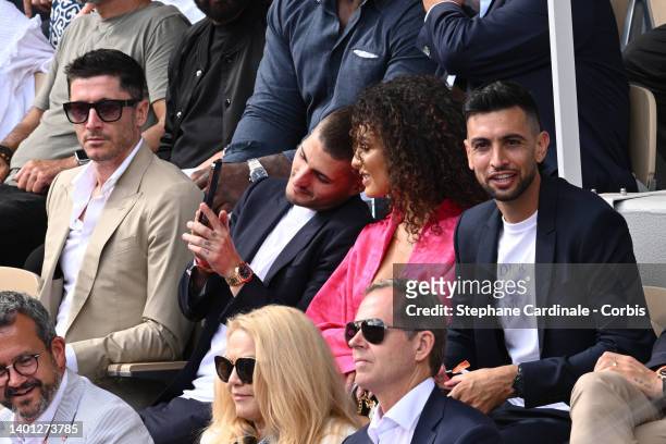Robert Lewandowski, Marco Verratti and his wife Jessica Aidi and Javier Pastore attend the French Open 2022 at Roland Garros on June 05, 2022 in...