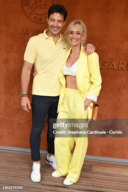 Bertrand Lacherie and Elodie Gossuin attend the French Open 2022 at Roland Garros on June 05, 2022 in Paris, France.