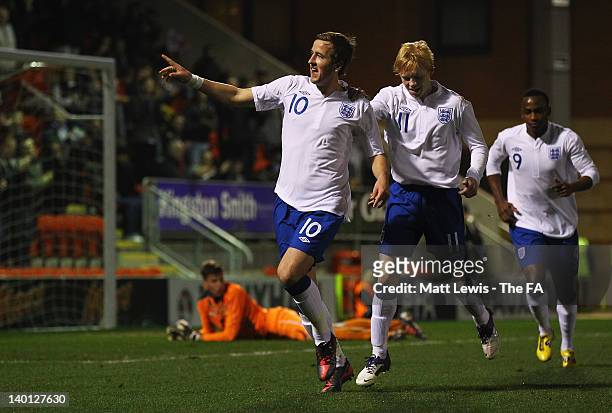 Harry Kane of England celebrates his goal with team mate Luke Williams during the Under-19 European Championship Qualifier match between England and...