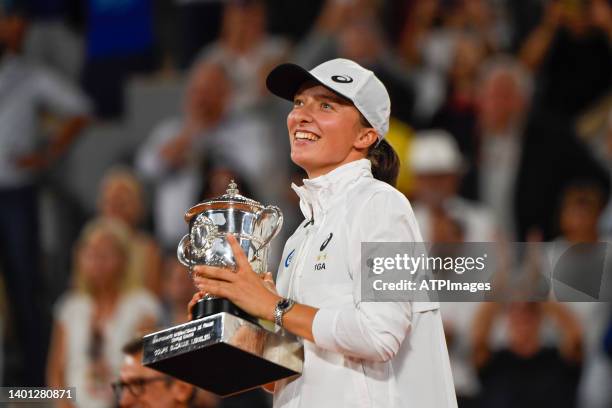 Iga Swiatek of Poland with cup after winning the women's final against Coco Gauff of USA on day 14 of the French Open 2022, second tennis Grand Slam...