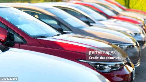 used vw cars parked at a public car dealership - bilmärken bildbanksfoton och bilder