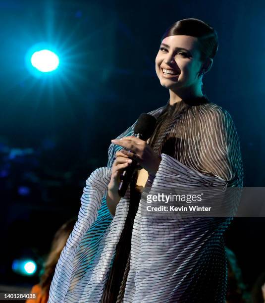 Sofia Carson speaks onstage at the 2022 MTV Movie & TV Awards at Barker Hangar on June 05, 2022 in Santa Monica, California.