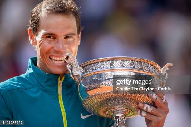 Rafael Nadal of Spain with the winners trophy after his victory against Casper Rudd of Norway during the Singles Final for Men on Court Philippe...