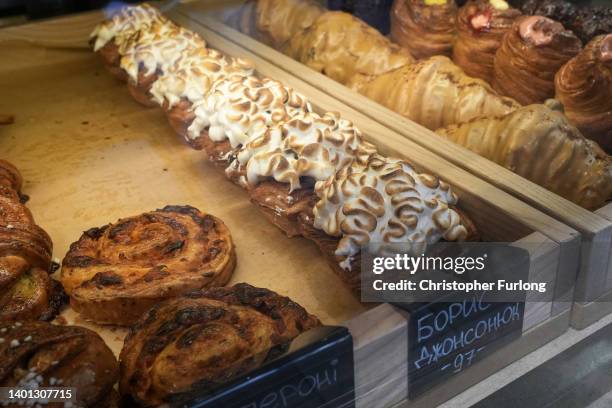 Cakes named after British Prime Minister Boris Johnson are seen for sale in the Zavertailo Cafe, one of Kyiv's top artisan bakeries on June 06, 2022...