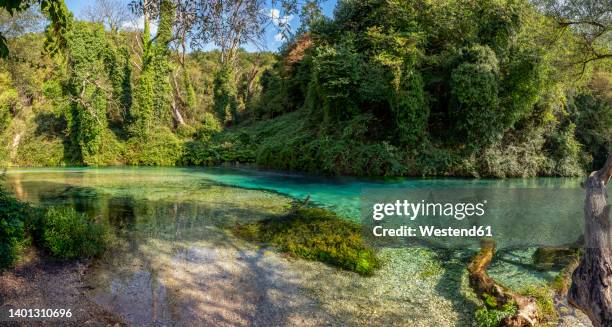 idyllic view of karst spring on sunny day, albania - blue eyes stock pictures, royalty-free photos & images