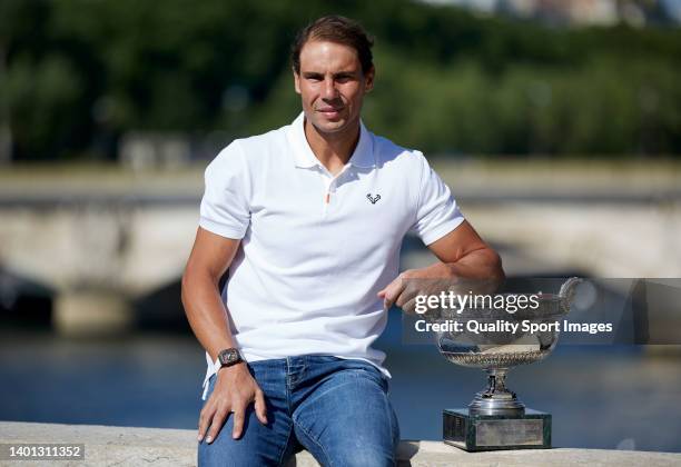 Rafael Nadal of Spain poses with the Musketeers trophy after winning in the Men's Singles Finals match against Casper Ruud of Norway of The 2022...