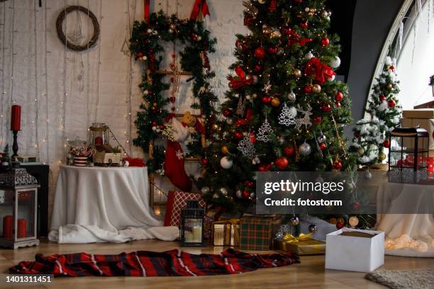 beautifully decorated living room for a christmas season - christmas tartan stock pictures, royalty-free photos & images