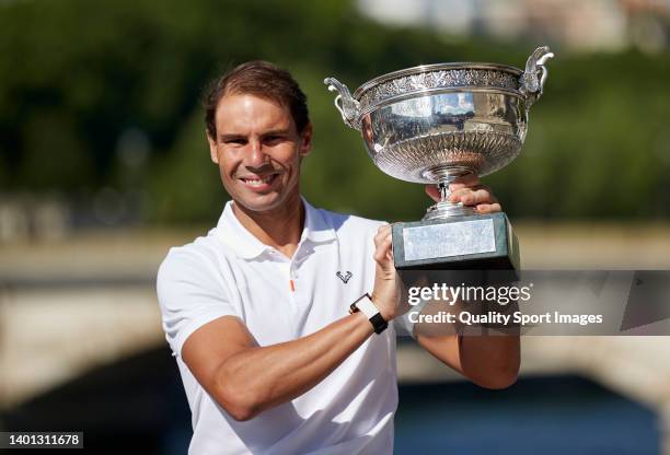 Rafael Nadal of Spain poses with the Musketeers trophy after winning in the Men's Singles Finals match against Casper Ruud of Norway of The 2022...