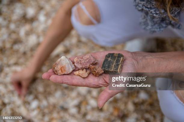 Person Collecting Rocks 3,234 Collecting Stones Stock Photos, High-Res Pictures, and Images ...