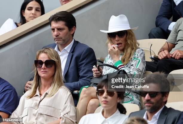 PIerre Rabadan and girlfriend Laurie Delhostal attend the men's final on day 15 of the French Open 2022 held at Stade Roland Garros on June 5, 2022...
