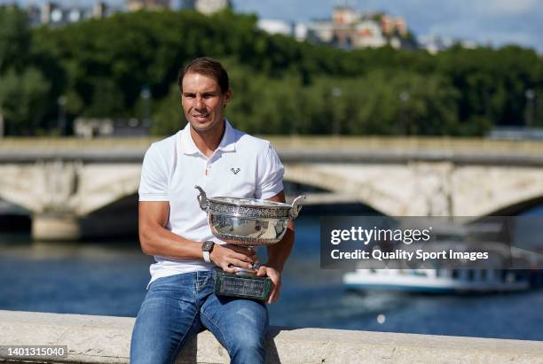 Rafael Nadal of Spain poses with the Musketeers trophy after winning in the Men's Singles Finals match against Casper Ruud of Norway of The 2022...