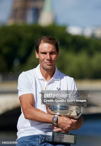 Rafael Nadal of Spain poses with the Musketeers trophy after winning in the Men's Singles Finals match against Casper Ruud of Norway of The 2022...