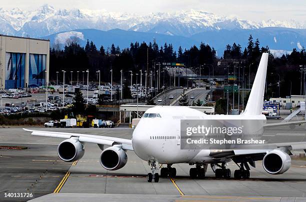 Boeing 747-8 Intercontinental airliner which will be delivered to an undisclosed VIP customer, taxis before taking off at the Paine Field February...