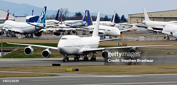 Boeing 747-8 Intercontinental airliner which will be delivered to an undisclosed VIP customer, taxis before taking off at the Paine Field February...