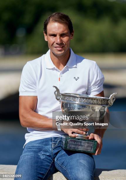 Rafael Nadal of Spain poses with the Musketeers trophy after winning in the Men's Singles Finals match against Casper Ruud of Norway of The 2022...