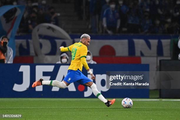 Neymar Jr. Of Brazil takes a free kick during the international friendly match between Japan and Brazil at National Stadium on June 6, 2022 in Tokyo,...