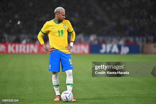 Neymar Jr. Of Brazil is seen before taking a free kick during the international friendly match between Japan and Brazil at National Stadium on June...