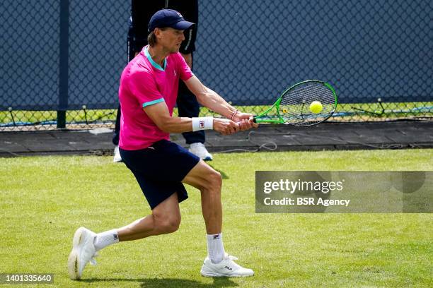 Andreas Seppi of Italy plays a backhand against Gijs Brouwer of the Netherlands during the Mens Singles Qualification match on Day 1 of the Libema...