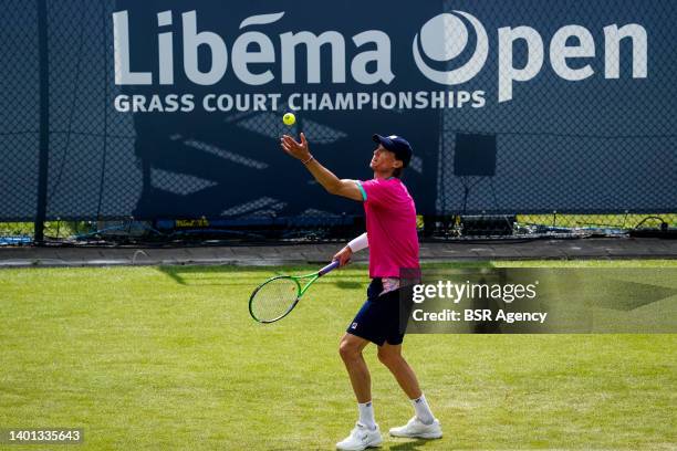 Andreas Seppi of Italy services against Gijs Brouwer of the Netherlands during the Mens Singles Qualification match on Day 1 of the Libema Open Grass...