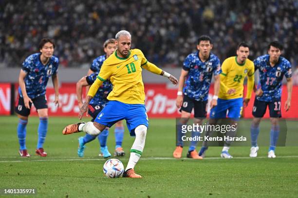 Neymar Jr. Of Brazil converts the penalty to score his side's first goal during the international friendly match between Japan and Brazil at National...