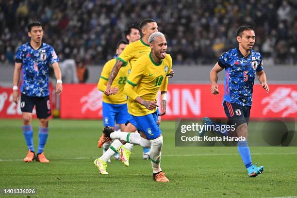 Neymar Jr. Of Brazil celebrates scoring his side's first goal during the international friendly match between Japan and Brazil at National Stadium on...