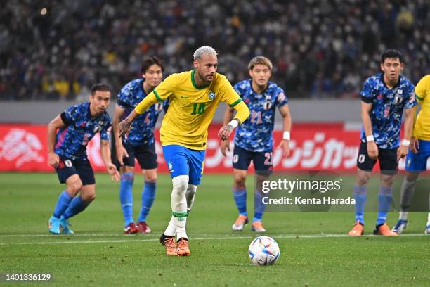 Neymar Jr. Of Brazil converts the penalty to score his side's first goal during the international friendly match between Japan and Brazil at National...