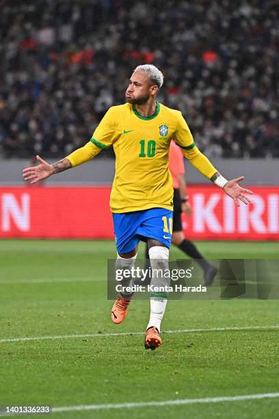 Neymar Jr. Of Brazil celebrates scoring his side's first goal during the international friendly match between Japan and Brazil at National Stadium on...