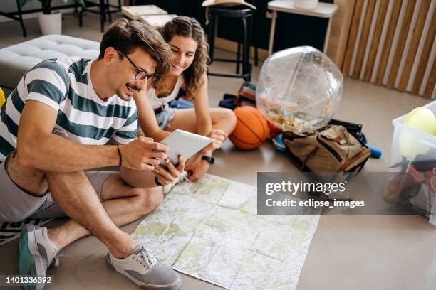 before traveling, preparation is important - couple planning stock pictures, royalty-free photos & images