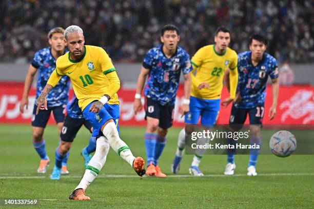 Neymar Jr. Of Brazil converts the penalty to score his side's first goal during the international friendly match between Japan and Brazil at National...